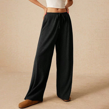 Female leisure trousers with wide legs and drawstring